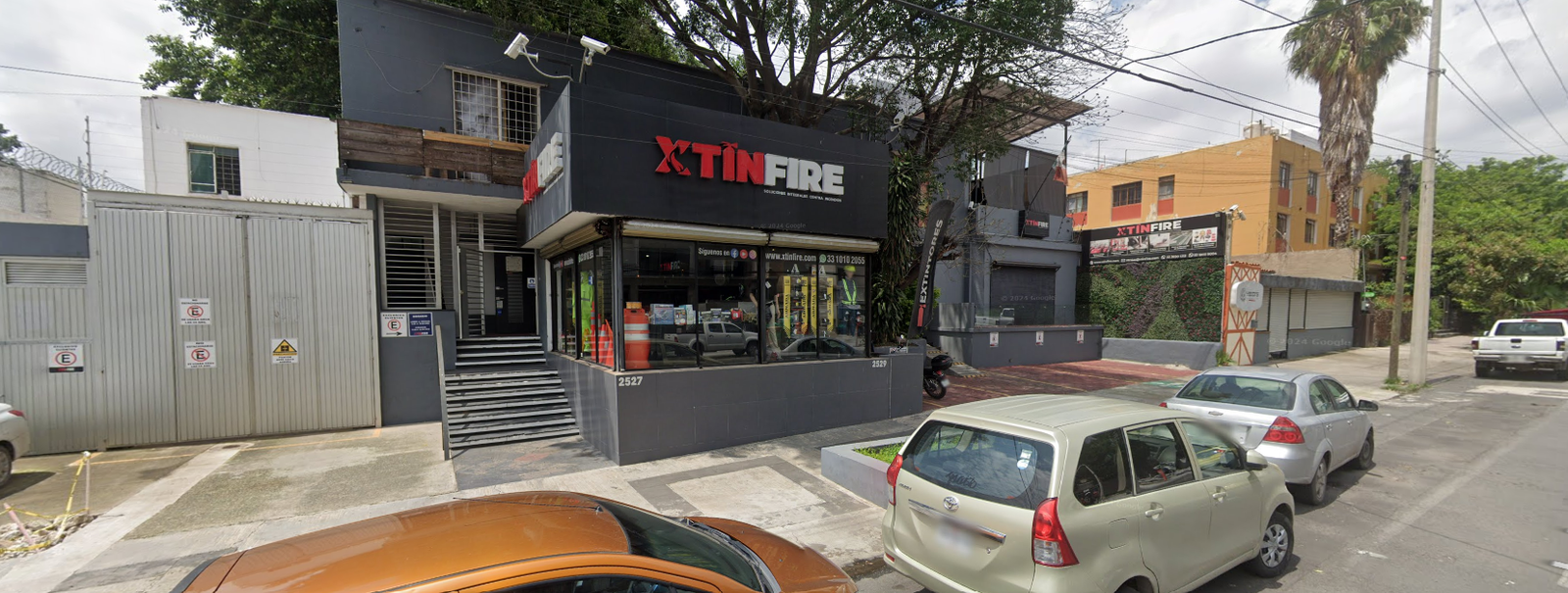 GrupoXtinfire — fachada y zona de atención